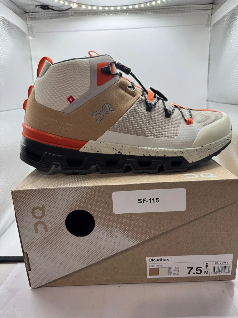 On Cloudtrax Mid-Top Hiking Sneaker in Chalk/Ivory with Orange Accents